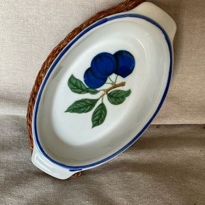 7" vintage stoneware baking dish with wicker basket.